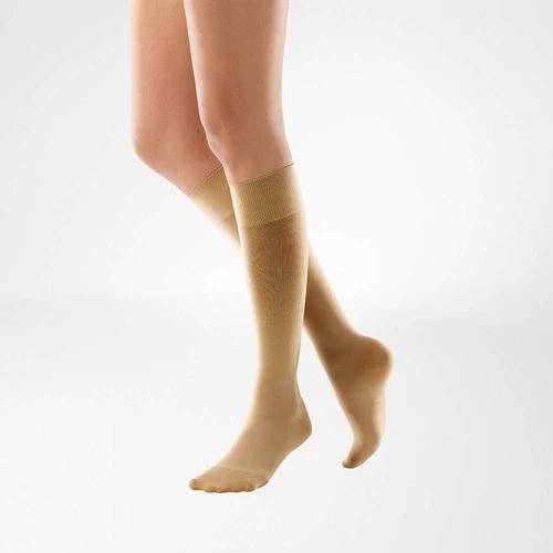 A caramel colour compression stockings. It is one of Bauerfeind Australia's best compression stockings, VenoTrain Knee High Compression Stockings (Caramel).